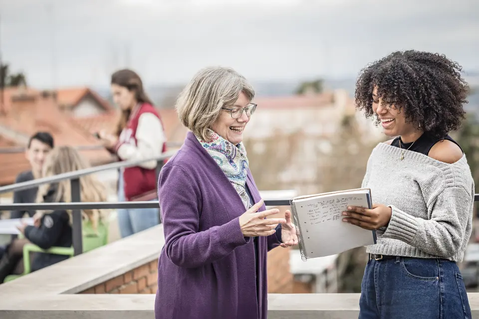 Students with professor Anne McCabe on the SIH rooftop.