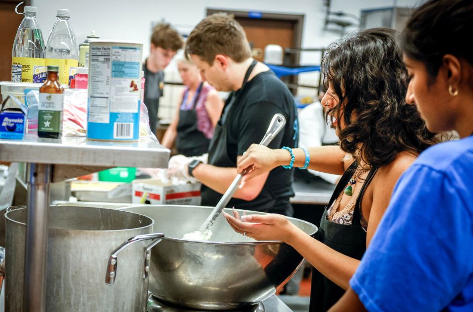 Students cooking in Campus Kitchen